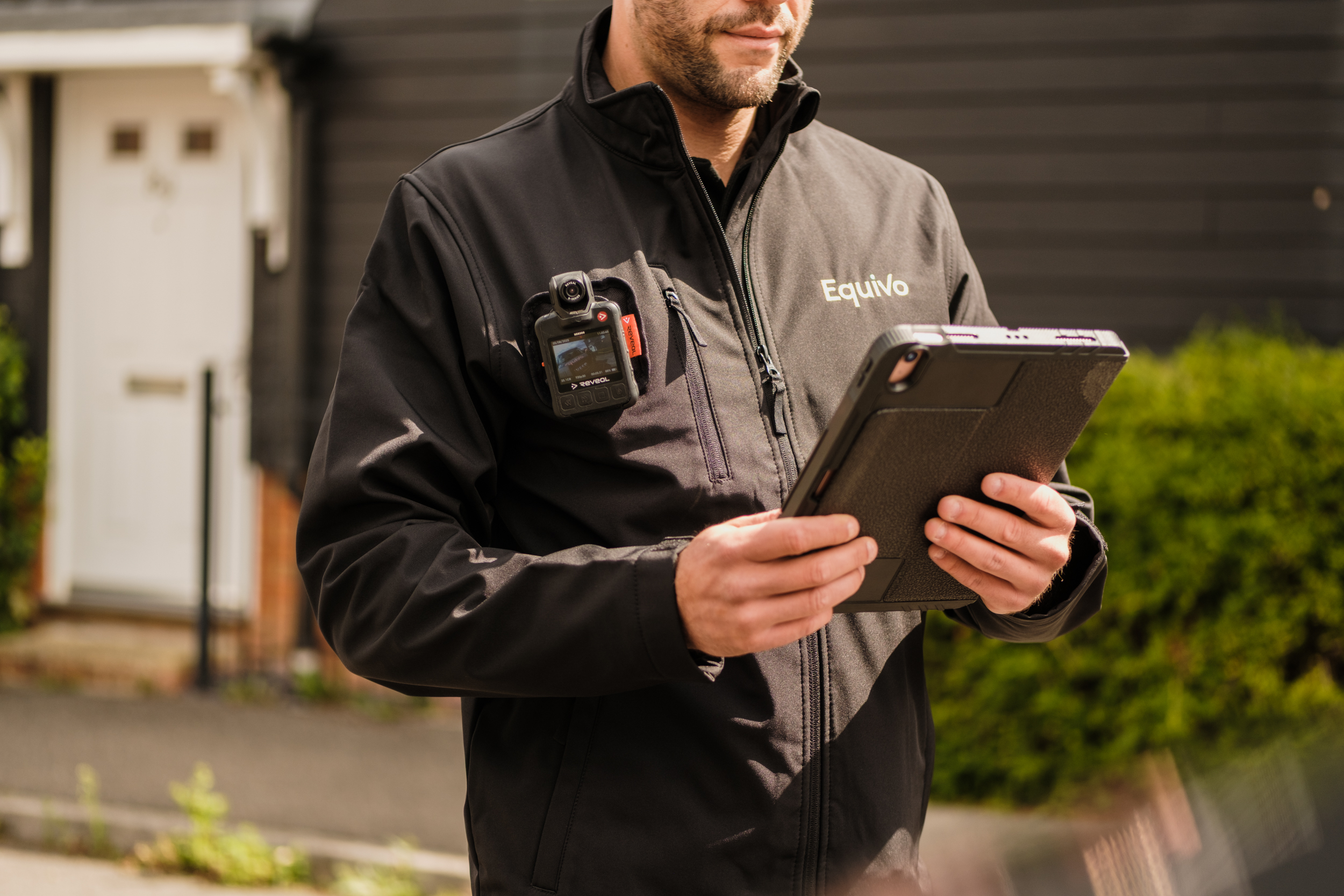 agent using their ipad to log the visit