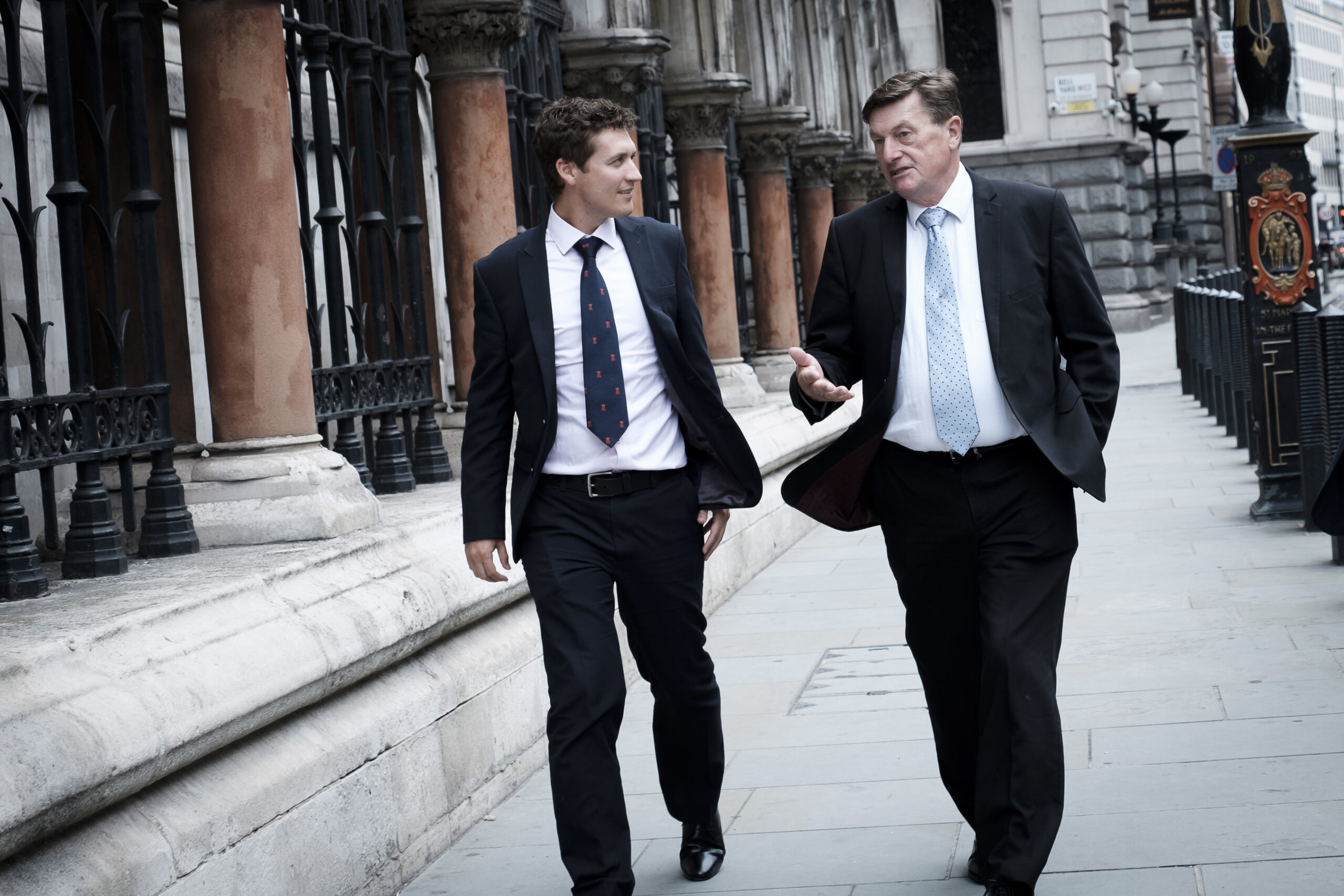 Two professionals walking in London