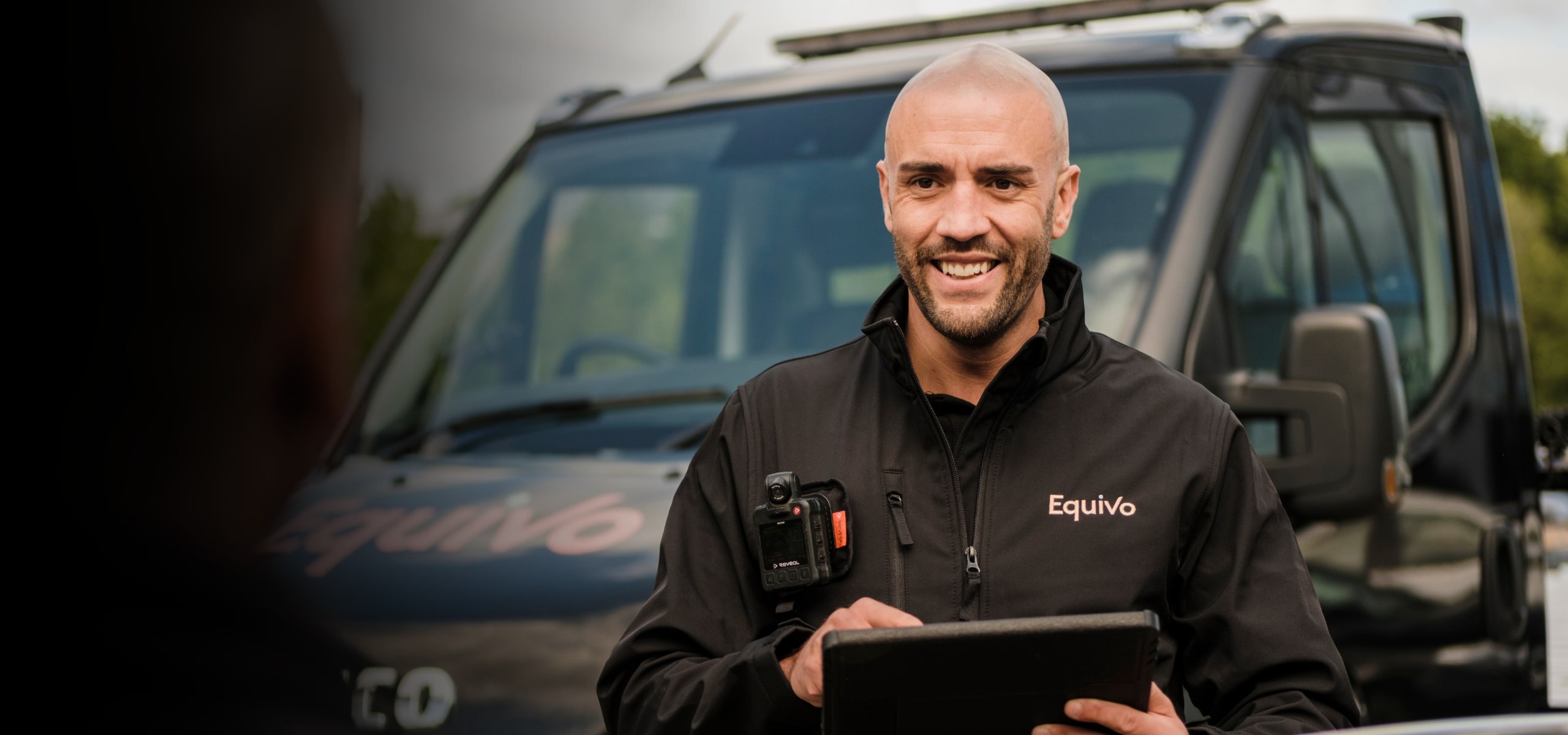 Agent talking to a customer with a smile on his face