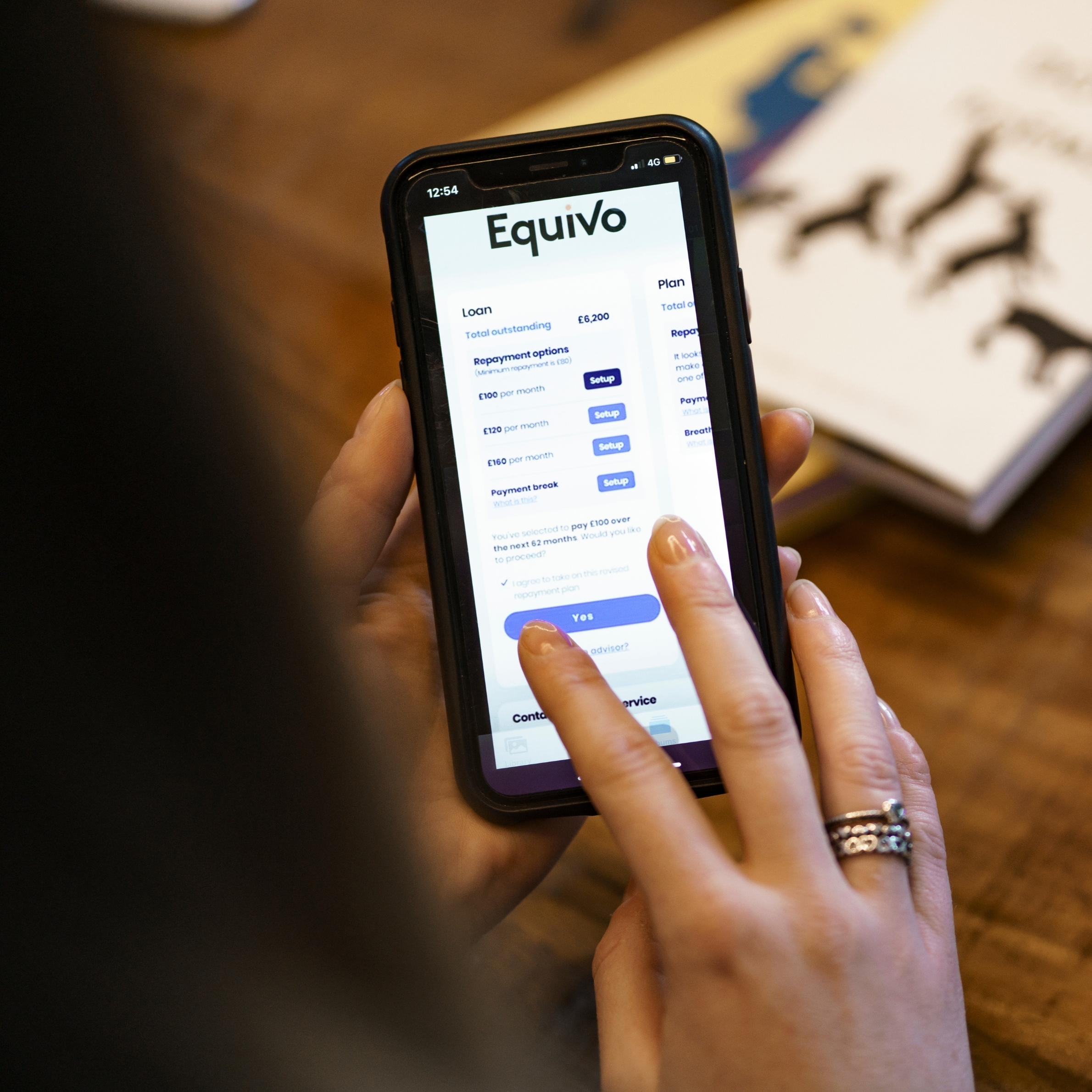 iPhone displaying our technology innovation to support customers with repayments